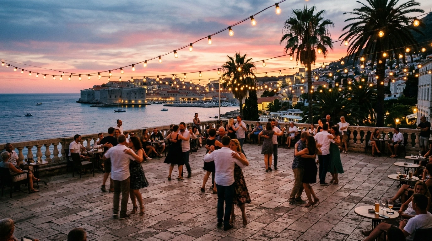 Dancers enjoying an outdoor bachata social near the beach in Barcelona
