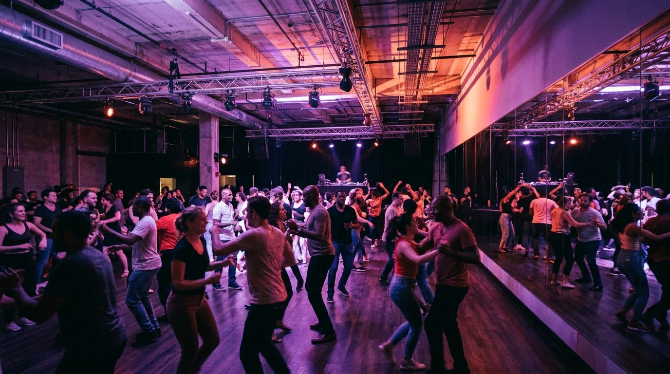 Dancers on a packed floor during a bachata social in New York City