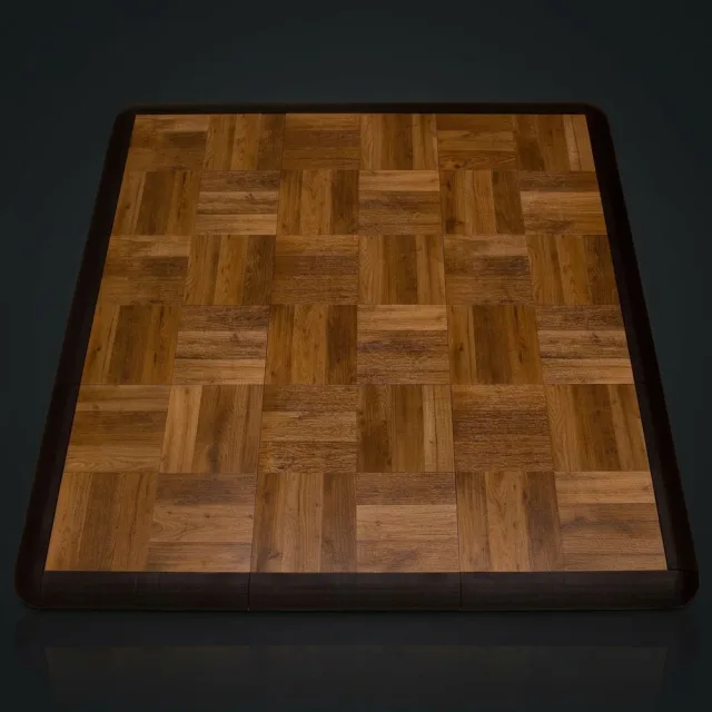 SnapLock modular practice dance floor with oak parquet tiles and dark edge trim against a dark studio backdrop